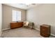 The spare bedroom offers a chair, dresser, filing cabinet, and natural light from a window at 2724 Rising Moon Way, Castle Rock, CO 80109