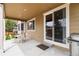 Cozy covered patio with outdoor seating, perfect for relaxing and entertaining with a gas grill at 2724 Rising Moon Way, Castle Rock, CO 80109
