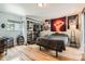 Cozy bedroom with wood floors, closet, and natural light, creating a comfortable and inviting space at 6213 Willow Ln, Boulder, CO 80301