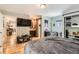 Spacious bedroom offering an ensuite bathroom, hardwood floors and generous natural light at 6213 Willow Ln, Boulder, CO 80301