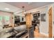 Kitchen showcases updated stainless steel appliances and a unique dining area at 6213 Willow Ln, Boulder, CO 80301