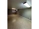 Spacious basement with neutral walls and carpeting at 7020 W Portland Ave, Littleton, CO 80128