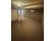 Spacious basement area featuring a closet and carpeted floor at 7020 W Portland Ave, Littleton, CO 80128