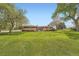 Large backyard with manicured lawn and home at 14505 W 52Nd Ave, Arvada, CO 80002