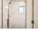 Bathroom shower featuring updated marble design at 14505 W 52Nd Ave, Arvada, CO 80002