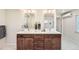 Stylish bathroom with double vanities, and modern fixtures at 14505 W 52Nd Ave, Arvada, CO 80002