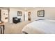 Spacious bedroom with chair, closet, and neutral decor at 14505 W 52Nd Ave, Arvada, CO 80002