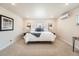 Bright bedroom with neutral tones, plush carpet, and ample natural light at 14505 W 52Nd Ave, Arvada, CO 80002