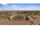 The image shows an aerial of a football field and surrounding community at 15201 Yellowthroat St, Parker, CO 80134
