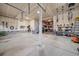 Well-organized garage featuring ample storage space, bike racks, and a variety of tools and equipment at 15201 Yellowthroat St, Parker, CO 80134