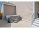 A modern hot tub sits outside of a home with easy-access stairs at 15201 Yellowthroat St, Parker, CO 80134