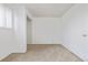 Modest bedroom features neutral walls, baseboard trim, and carpet flooring at 5542 Sable St, Denver, CO 80239