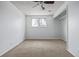 Cozy bedroom with carpet, a ceiling fan, and natural light from the window at 5542 Sable St, Denver, CO 80239