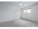 Bedroom with carpeting, window and a ceiling fan at 5542 Sable St, Denver, CO 80239