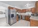 Updated kitchen features stainless steel appliances, granite countertops and plenty of cabinet space at 5542 Sable St, Denver, CO 80239