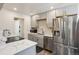 Modern updated kitchen with stainless steel appliances and ample storage space at 7995 E Mississippi Ave # F23, Denver, CO 80247