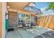 View from patio showing privacy fence, convenient bike storage, and sliding door to the living room at 7995 E Mississippi Ave # F23, Denver, CO 80247