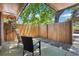 Outdoor patio with furniture and wood fence features convenient bicycle storage at 7995 E Mississippi Ave # F23, Denver, CO 80247