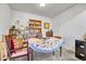 Office with a large desk, bookshelves, and a window for natural light at 14226 E 1St Dr # B10, Aurora, CO 80011