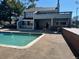 Community pool featuring a sunny pool deck area and lounge chairs at 14226 E 1St Dr # B10, Aurora, CO 80011