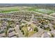 Residential neighborhood featuring sidewalks, lawns, trees, green spaces and community sports park at 4553 Red Deer Trl, Broomfield, CO 80020