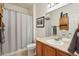 Well-maintained bathroom featuring a shower-tub combo, vanity, and neutral decor, creating a functional space at 4553 Red Deer Trl, Broomfield, CO 80020