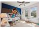 Playful bedroom featuring bright paint, modern windows, a ceiling fan and a unique loft bed at 4553 Red Deer Trl, Broomfield, CO 80020