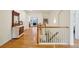 Inviting entry hall with hardwood floors, staircase, and elegant decor, enhancing the home's charm at 4553 Red Deer Trl, Broomfield, CO 80020
