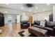 Spacious living room featuring hardwood floors, recessed lighting, comfortable seating, and plenty of open space at 4553 Red Deer Trl, Broomfield, CO 80020
