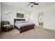 Spacious primary bedroom with an ensuite bath, soaking tub, and a reading nook at 4553 Red Deer Trl, Broomfield, CO 80020