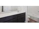Bright bathroom with updated vanity and shower over tub at 19059 E 94Th Pl, Commerce City, CO 80022
