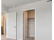 Bright bedroom features an open closet and fresh paint at 19059 E 94Th Pl, Commerce City, CO 80022