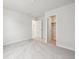 Spacious bedroom with carpeting and closet access at 19059 E 94Th Pl, Commerce City, CO 80022