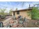 Backyard featuring a fire pit and seating, perfect for outdoor gatherings at 865 S Everett St, Lakewood, CO 80226