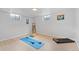 Spacious basement area, ideal for home gym, features workout equipment and light-filled windows at 865 S Everett St, Lakewood, CO 80226