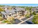 Aerial view of an apartment complex showcasing parking, landscaping, and balconies at 7433 S Quail Cir # 1924, Littleton, CO 80127