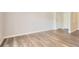 Bright living area featuring wood floors, fresh paint, and new trim, perfect for comfortable living at 7433 S Quail Cir # 1924, Littleton, CO 80127