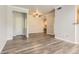 Inviting living room showcasing wood floors, neutral walls, and modern ceiling fan at 7433 S Quail Cir # 1924, Littleton, CO 80127
