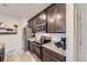 A kitchen featuring granite countertops, stainless steel appliances, and ample cabinet space at 21613 E 59Th Pl, Aurora, CO 80019