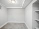Finished basement room with neutral carpet, fresh light paint, and a small window at 3855 N Cook St, Denver, CO 80205