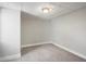 Basement room featuring a decorative tile ceiling and a flush mount light fixture at 3855 N Cook St, Denver, CO 80205