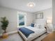 Comfortable bedroom with a plush bed, ample natural light, and stylish decor at 3855 N Cook St, Denver, CO 80205