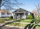 Quaint home with a tidy lawn, showcasing its classic design and curb appeal at 3855 N Cook St, Denver, CO 80205