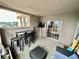 Relaxing balcony with outdoor seating and sliding glass door at 300 W 11Th Ave # 10D, Denver, CO 80204