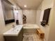 Bright bathroom featuring subway tile, a shower and tub combination, and modern fixtures at 300 W 11Th Ave # 10D, Denver, CO 80204