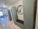 Mud room with built-in storage cabinets and bench, leading to living area at 300 W 11Th Ave # 10D, Denver, CO 80204