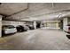 Parking garage with assigned spaces and secure parking in an underground setting at 300 W 11Th Ave # 10D, Denver, CO 80204