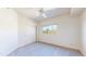 Bedroom with carpet floor, built in closet with mirror doors, and window at 11374 Xavier Dr # 202, Westminster, CO 80031