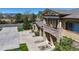 Attractive home with stone accents, a private balcony, and an attached garage at 11374 Xavier Dr # 202, Westminster, CO 80031