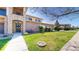 Beautiful home exterior featuring stone accents, a front door wreath, and a well-maintained lawn at 11374 Xavier Dr # 202, Westminster, CO 80031